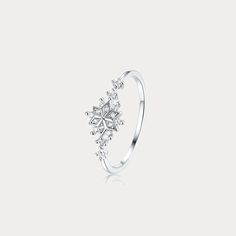 a white gold ring with diamonds on it