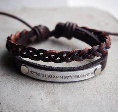 "Handmade Crafts/ Custom Engraved Mens Coordinate Gift, Mens Leather Coordinates Bracelet, Adjustable Braided leather bracelet, Gift for him Custom hand stamped Bracelet, Personalized any information on the bracelet, the best gift for boyfriend or girlfriend, best friends, mom, dad etc. unisex style. Details: Adjustable band up to 10\" wrists/ One side to slide smoothly and the other side is steady fastened. Raw materials: Real leather+metal hand braided real leather  Metal color: Silver / copper / gold Max characters: 17 To see more different styles handmade bracelets, click https://www.etsy.com/shop/HandmadeGhost If you like my shop, just fav it, if you want the bracelets, you can add to your shopping cart. Any problem, just inquiry directly from the home page of my shop https://www.etsy Masculine Braided Leather Bracelet For Gift, Rustic Stamped Leather Bracelet Gift, Brown Leather Bracelet With Engraving Option, Masculine Brown Braided Bracelet For Gift, Masculine Brown Braided Bracelet As Gift, Rustic Waxed Cord Bracelets As Gift, Coordinates Gifts, Best Gift For Boyfriend, Coordinates Gift