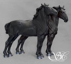 two black horses standing next to each other on a gray background with the word love written below it