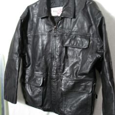 BAGAZIO Men's Black Heavy Leather Quilt Lined Jacket Size M. pit to pit 22" no rips on leather Casual Black Leather Jacket With Multiple Pockets, Classic Black Travel Outerwear, Casual Leather Jacket With Multiple Pockets For Outdoor, Classic Black Leather Jacket With Multiple Pockets, Black Travel Outerwear With Multiple Pockets, Classic Black Biker Jacket With Multiple Pockets, Vintage Leather Jacket With Zip Fly, Vintage Black Biker Jacket With Pockets, Vintage Black Long Sleeve Leather Jacket