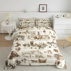 a bed with a white and brown comforter on top of it next to a night stand