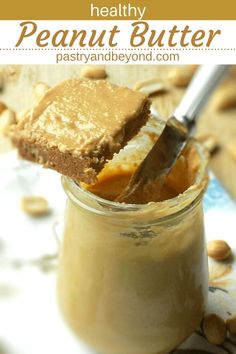 peanut butter in a jar with a spoon