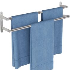 two blue towels hanging on a towel rack