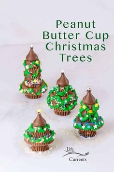 four cupcakes decorated like christmas trees on a white background with the words peanut butter cup christmas trees