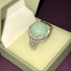 Judith Ripka Delicate Green Color Jade & Diamonique Ring If You Are A Judith Ripka Collector, You’ll Love To Add This “Rare” Jade Ring, To Your Own Collection! Metal: 925 Sterling Silver Fully Hallmarked Condition: Nwot Size: 8 & Can Be Sized By Your Jeweler. Beautiful Statement Or Cocktail Ring! Judith Ripka Sterling Light Green Ring Is Just Gorgeous!!! A Great Investment, As Jade Has Increased In Value In Recent Years!!! Luxury Jade Rings, Collectible Jade Gemstone Rings, Luxury Green Jade Rings, Antique Silver Jade Ring, Diamonique Rings, Judith Ripka Ring, Judith Ripka, Green Rings, Jade Ring