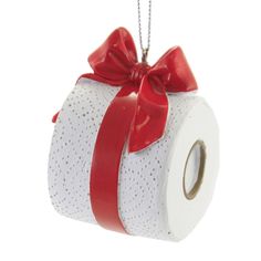 a roll of toilet paper with a red bow hanging from it's front end