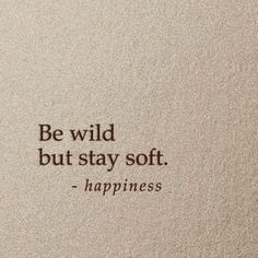 the words be wild, but stay soft happiness is written in brown on a white background