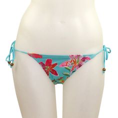 Tropical Orchid Cinched Back Side Ties - Loco Boutique Adjustable Tropical Swimwear For Pool, Fitted String Swimwear For Beach Party, Fitted String Beachwear Swimwear, Fitted String Swimwear For Beach, Floral Print Stretch Swimwear With Tie-side Bottom, Beachwear Swimwear With Tropical Print And Tie-side Bottom, Fitted Tropical Swimwear With Tie-side Bottom, Tropical Tie-side Bottom Swimwear For Pool, Tropical Tie-side Swimwear For Pool