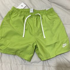 Above The Knee Fit. Brand New. Size L Nike Short Swim Trunks For Spring, Nike Swim Trunks For Spring, Nike Swim Trunks With Pockets For Summer, Nike Swim Trunks For Spring Sports, Casual Nike Swim Trunks, Short Swim Trunks For Streetwear In Spring, Nike Green Shorts For Spring, Green Nike Shorts For The Beach, Casual Green Swim Trunks