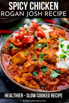 the recipe for spicy chicken rogan josh recipe is in a bowl with sour cream on top