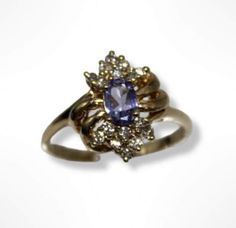 ⚓14k Yellow Gold Tanzanite Diamond Cluster Ring ( 7.25 ) Solid 14K gold, stamped 14K. Not filled or plated. In excellent condition! We sell the highest quality vintage and pre-owned items. Free domestic shipping always! On its way to you in 1 business day.  30 day return policy!  ⚓The Details Size 7.25 1 oval Tanzanite 16 round diamonds 3.1 grams ⚓Who We Are  We are a small, family-owned business in Plymouth, MA. Located in the heart of Main Street, Main Street Jewelry Co.'s mission is to find o Estate Oval Ring Stamped 14k, Yellow Gold Oval Estate Rings, Estate Style Oval Yellow Gold Rings, Oval Yellow Gold Estate Rings, Estate Style Oval Gold Jewelry, Estate Style Yellow Gold Ring, Estate Yellow Gold Rings For Collectors, Estate Gold Ring As Gift, Vintage Gold Multi-stone Cluster Ring