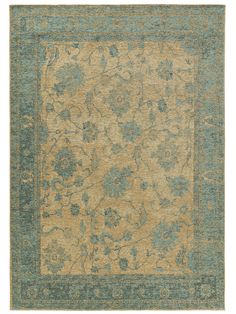 an area rug with blue and beige colors