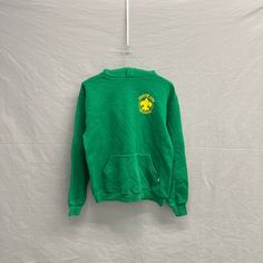 Medium / 1980s Russell Athletics Troop #136 Lino Lakes, MN Green Hoodie Hooded Sweatshirt Pit to Pit: 19.5in Top Collar to Bottom: 24in Sleeve Length: 32in Check photos before purchasing! ITEM IS SECONDHAND! Please take the time to review our shop policies listed on our homepage before purchasing. We do NOT accept returns, but will gladly accept exchanges. All items are vintage, and sold AS IS. Thank you for shopping with us! - RatRunners Green Crew Neck Sweater With Drawstring Hood, Green Sweater With Drawstring Hood For Streetwear, Sporty Green Hooded Sweater, Green Drawstring Hood Sweater For Streetwear, Green Crew Neck Sweatshirt With Kangaroo Pocket, Vintage Hoodie Sweatshirt For Sports, Retro Sports Hoodie For Winter, Retro College Hoodie With Drawstring Hood, Green Hooded Sweater For Streetwear