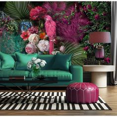 a living room filled with lots of colorful furniture and flowers on top of a rug