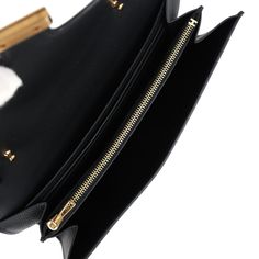 This Constance Wallet To Go is in Black epsom leather with gold hardware and has tonal stitching, metal "H" snap lock closure, open front compartment and removable crossbody strap.The interior is lined with Black epsom leather and two main compartments with six credit card slots and a zippered center compartment with Hermes H lock pull.Collection: WOrigin: FranceCondition: New and never worn (plastic on hardware) Accompanied by: Hermes box, felt, strap, strap dustbag and ribbonMeasurements: 8" w Luxury Travel Wallets With Gold-tone Hardware, Classic Evening Wallets With Detachable Strap, Designer Clutch Wallet With Gold-tone Hardware, Black Business Wallet With Gold-tone Hardware, Business Black Wallet With Gold-tone Hardware, Gold Crossbody Wallet For Evening, Evening Bag In Epsom Leather With Metal Hardware, Luxury Leather Wallets With Branded Hardware, Luxury Wallets With Detachable Strap Crossbody