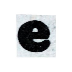 the letter e is made out of black yarn and has a small hole in it