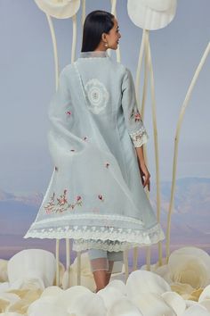 Ice blue three fourth sleeves stand collar V neck kurta in linen base with delicate rose bud embroidery, net work patch details and adorned with lace embellishments. Paired with a sheer border straight pant and rose motif embroidered dupatta. - Aza Fashions Fitted Linen Kurta For Spring, Spring Linen Straight Kurta Set, Spring Linen Fitted Kurta, Eid Long Sleeve Kurta With Yoke Detail, Eid V-neck Kurta With Intricate Embroidery, Fitted Long Sleeve Kurta With Embroidered Cuffs, Embroidered Light Blue Long Sleeve Kurta, Blue Floral Embroidered Tunic Kurta, Kurta Patterns