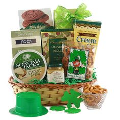 a st patrick's day gift basket with cookies, crackers and other treats