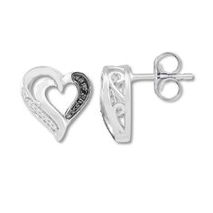 Round white and black diamonds add shimmer to these darling heart earrings for her. The earrings are fashioned in sterling silver and secure with friction backs. Black diamonds are treated to permanently create the intense black color. Anniversary Black Diamond Earrings, White Heart Earrings With Diamond Accents, Silver Heart Earrings With Diamond Accents, Silver Double Heart Earrings With Diamond Accents, Heart Shaped Sterling Silver Diamond Earrings, White Sterling Silver Heart Earrings With Diamond Accents, Sterling Silver Earrings With Black Diamonds For Anniversary, Diamond Heart Earrings, Silver Jewelry Diy