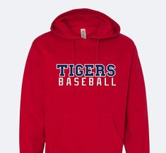 a red hoodie with the words tigers baseball printed on it's chest and back