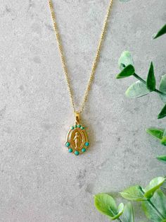 The Mary Medallion in Turquoise features a stunning 3/4" Mary Medallion with enamel Turquoise accents on a fine chain. This necklace is a great layering piece. Mary Medallion on 18" chain with 2" extender chain 14k gold over brass Designed and assembled in Sonoma, California Out of stock? This item typically restocks in about 1-2 weeks Gold Turquoise Necklace With Lobster Clasp, Gift, Turquoise Charm Necklace With Adjustable Chain, Gold Turquoise Adjustable Pendant Necklace, Gold Turquoise Pendant Necklace With Adjustable Chain, Adjustable Gold Turquoise Pendant Necklace, Gold Turquoise Necklace With Adjustable Chain, Turquoise Pendant Charm Necklace With Adjustable Chain, Turquoise Gold-plated Necklace With Adjustable Chain, Turquoise Gold Plated Necklace With Adjustable Chain