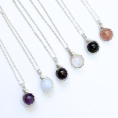 This elegant twist wire wrapped crystal necklace, available in sterling silver and 14k gold filled, features obsidian, moonstone, amethyst, aquamarine, garnet, and strawberry quartz.  💐𝐃𝐄𝐓𝐀𝐈𝐋 * Handmade item * Gemstones: Amethyst, Aquamarine, Garnet, Moonstone, Gold Sheen Obsidian, Strawberry Quartz, all 8mm round * Sterling Silver: 1.3mm Flat Cable, available in 16",  18" or 20" length  * 14K Gold Filled: 1.3mm Flat Cable, available in 16", 18" or 20" length 💎𝑨𝒎𝒆𝒕𝒉𝒚𝒔𝒕 - It is kn Elegant Hand Wrapped Round Pendant Necklace, Silver Crystal Necklace With Gemstone Beads, Adjustable Wire Wrapped Crystal Necklace With Round Pendant, Silver Crystal Necklace With Gemstone Beads And Round Pendant, Silver Crystal Necklace With Round Gemstone Pendant, Silver Jewelry With Gemstone Beads, Gemstone Pendant In Silver-plated Wire, Silver Sterling Wire Wrapped Crystal Necklaces, Spiritual Gemstone Jewelry With Silver Plated Wire