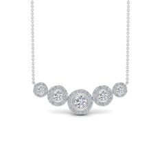 This Graduated Halo Diamond Necklace features five round shaped diamonds held in illusion setting, encircled by round cut stones creating a majestic halo. These five halo diamonds are adjoined to each other and held on a delicate white gold chain.   Round cut diamonds of 1.32 Total Carat Weight with Clarity SI2 and Color G are held in illusion and prong setting respectively. Total Number Of Diamonds:- 81 Free shipping within USA. 1 Year Manufacturing Warranty. 30 Days Return Policy with Lifetime Upgrade.  Receive your merchandise within 5-7 business days via FedEx or UPS, and Fascinating Diamonds only ships out signature required packages maintaining complete security. Pay with ease choosing from the wide range of payment methods including credit and debit cards, PayPal, Wir White Round Halo Diamond Necklace, Dazzling Round Halo Diamond Necklace, White Halo Diamond Necklace, Dazzling Round Cut Halo Diamond Necklace, Anniversary Halo Diamond Necklace With Round Cut, Round Cut Halo Diamond Necklace For Anniversary, Anniversary Round Cut Halo Diamond Necklace, Double Halo Engagement, 14k Gold Wedding Ring