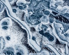 an aerial view of snow and ice on the ground