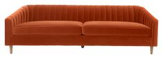 an orange velvet couch with wooden legs