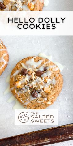 two cookies with white icing and chocolate chips