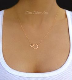 * D E T A I L S * Small and dainty circle infinity necklace in gold, rose rold or 100% sterling silver Layer with other necklaces or perfect by itself! * 18k gold vermeil, rose gold vermeil or sterling silver hoops are polished to shine  * Made with a shimmery 14k gold filled, sterling silver or rose gold filled chain * Attached length of hoops is 18mm combined * Circle has a tiny stamp on back of authenticity on the back side  * Total necklace length is shown at 18" * Choose your favorite lengt Gold Infinity Necklace, Infinity Necklace Gold, Mother Daughter Necklace, Infinity Pendant, Daughter Necklace, Infinity Necklace, Small Rose, Double Ring, Sterling Silver Hoops