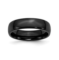 a black wedding ring on a white background