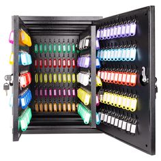 an open drawer with many different colored pens and pencils in it on a white background