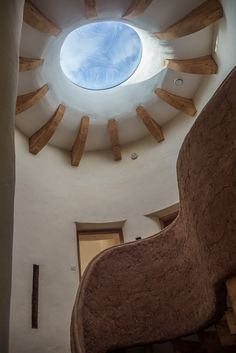 the inside of a building with a skylight above it