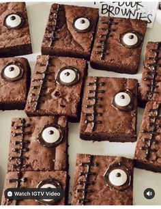 some brownies with eyeballs on them are arranged in the shape of squares and rectangles