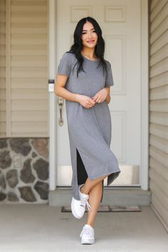 This is the perfect dress to feel comfortable in. It reminds us of the comfort your favorite tee shirt brings that you’ve kept for years! This dress is no different. Have your comfort in style with our slit hem tee shirt dress. Models are 5’6” and 5'8" wearing a size small Length of a small is 41" in the front and 47" in the back 95% Polyester, 5% Spandex Winter T Shirt, Dress Models, Winter T Shirts, Sporty Dress, Tee Shirt Dress, Sea Green, Split Hem, Gray Dress, Fashion Sense