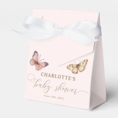 a baby shower bag with two butterflies on it and the name charlotte's baby shower