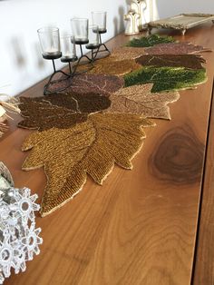 a wooden table topped with lots of place mats