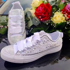 These White Converse Shoes Are Adorned With White Pearls And Clear Gem Stones. They Have White Ribbon Laces With Normal White Replacement Laces And Some Extra Gems Just In Case. Perfect To Wear For Your Wedding, Bridal Shower, Or Bachelorette Party Or Just To Be Fun And Fancy. Woman's Size 8.5, Fit True To Size. Smoke Free Home. Offers Welcome. White Slip-on Party Sneakers, White Slip-on Sneakers For Party, White Embellished Low-top Wedding Shoes, White Party Sneakers With Rhinestones, White Rhinestone Party Sneakers, White Embellished Sneakers For Party, White Embellished Party Sneakers, Elegant Embellished White Sneakers, Elegant White Embellished Sneakers