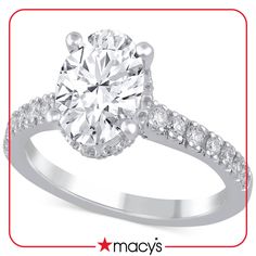 a white gold engagement ring with diamonds on it