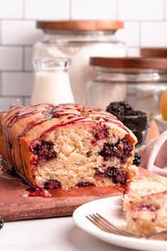 a loaf of blackberry lemon bread on a cutting board