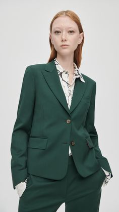 Offering sharp, elegant tailoring separates in both formal and casual styles, Paul Smith women's trouser suits come in an array of textures and tones, including check, pinstripe and the crease-resistant 'A Suit To Travel In'. Green Suit