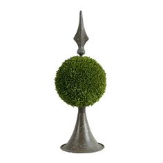 a silver vase with a small green ball on it's top and an iron finial