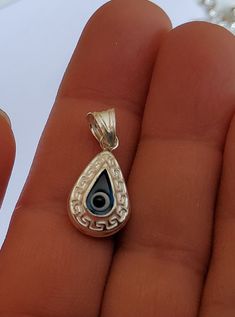 1 Solid Sterling Silver 925 14k 18k 22k 24k Gold plated teardrop shaped hamsa Evil eye pendant charm Size :24 mm/ 1 inches full length with bail Bead size: 15.5 mm x 11 mm x 7 mm Weight; 1.60 g/ 1 evil eye beads charm Description:1 Solid Sterling Silver 925 14k 18k 22k 24k Gold plated teardrop shaped hamsa Evil eye pendant charm. they are symetrical in both side we have bright sterling silver of the same charm as shown in last image, listed seperately please visit our other items in store, we of Sterling Silver Teardrop Evil Eye Jewelry, Silver Evil Eye Charm Necklace With Round Pendant, Symbolic Eye-shaped Silver Jewelry, Spiritual Eye-shaped Sterling Silver Jewelry, Hamsa Evil Eye, Hamsa Necklace Silver, Evil Eye Beads, Beads Charm, Eye Beads