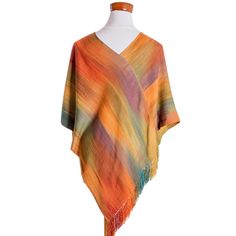 Asymmetrical Hand Woven Rayon Poncho from Guatemala - Autumnal Charm | NOVICA Bohemian One-size Handwoven Cape, Bohemian Handwoven One-size Cape, Multicolor Bohemian Poncho For Fall, Bohemian Multicolor Poncho For Fall, Bohemian Woven Poncho For Fall, Fall Bohemian Woven Poncho, Multicolor Handwoven Folk Poncho, Multicolor Fringe Shawl Poncho, Multicolor Hippie Shawl Poncho