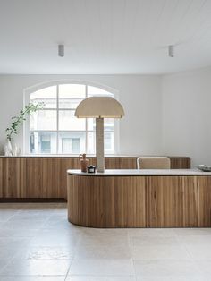 a large wooden table sitting in the middle of a room