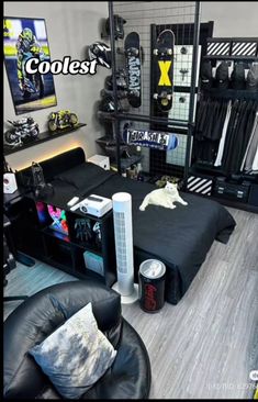 a room filled with lots of black furniture and items on shelves next to a bed