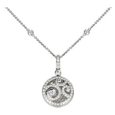 A Graff Diamond on Diamond Pendant on a Diamond Chain Necklace made in 18K White Gold. The total weight is 11.08 grams. The length is 16.75." The diamonds weigh appx. 3.90 carats. There is a certificate of quality from GRAFF. Formal Round Pendant Diamond Necklace With Accents, Formal Round Diamond Necklace With Accents, Formal Round Pendant Diamond Necklace, Platinum Single Cut Diamond Necklace, Luxury Round Diamond Necklace In Platinum, Platinum Diamond Necklace With Diamond Accents, Platinum Necklace With Pave Setting In Fine Jewelry Style, Luxury Round Diamond Necklace, Fine Jewelry Platinum Diamond Necklace With Round Pendant