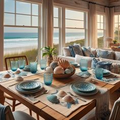 a living room filled with furniture next to a window covered in blue and white decor