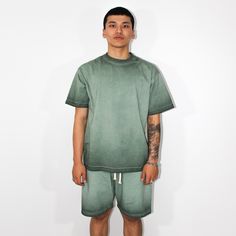 Galore Garments Collection: 250GSM Oversized T-shirt in Acid Wash Forest Green. Crafted from high-quality 250GSM fabric, this unisex tee offers a slightly oversized fit that fits beautifully on any body type. Enhanced with a acid wash, it exudes a vintage charm that makes it an instant wardrobe staple. See shipping and Size Guide below. Made-to-Order. Green Sporty T-shirt With Relaxed Fit, Sporty Washed Short Sleeve T-shirt, Green Relaxed Fit Casual T-shirt, Casual Green T-shirt With Relaxed Fit, Green Short Sleeve Streetwear Tops, Green Short Sleeve Tops For Streetwear, Green Washed Crew Neck Top, Relaxed Fit Washed Green Top, Green Loose Sporty Top